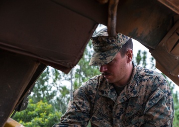 Camp Lejeune Marine fixes bulldozer on Mocoron Airfield
