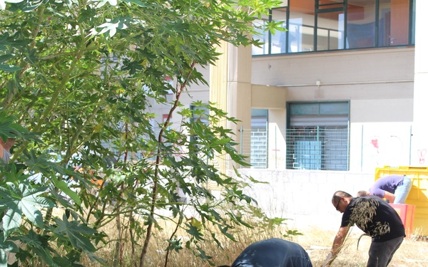 Marines, sailors clean up after-school center in Catania