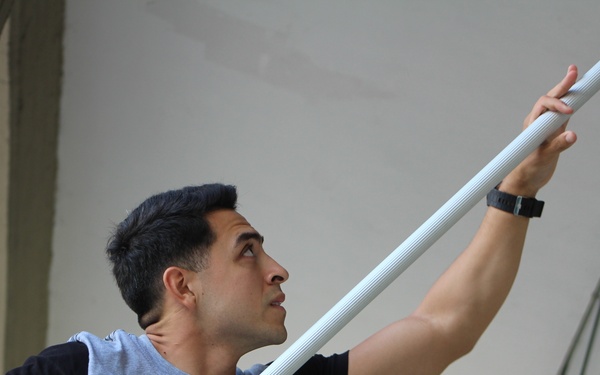 Marines, sailors clean up after-school center in Catania