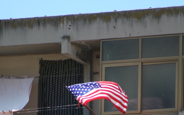 Marines, sailors clean up after-school center in Catania