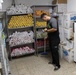 Marines, sailors don their aprons, serve at Sicilian soup kitchen