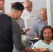 Marines, sailors don their aprons, serve at Sicilian soup kitchen