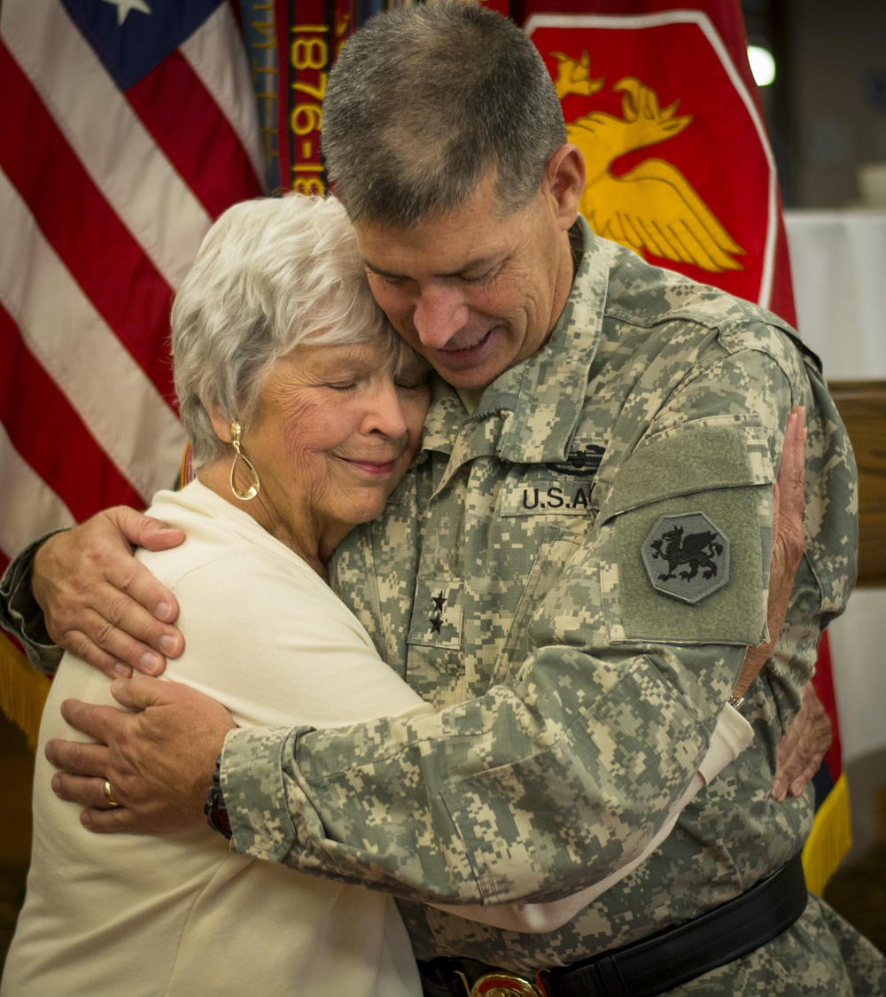 Proud mom hugs her major general son