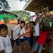 Philippine children interact with U.S. Marines during PHIBLEX 15