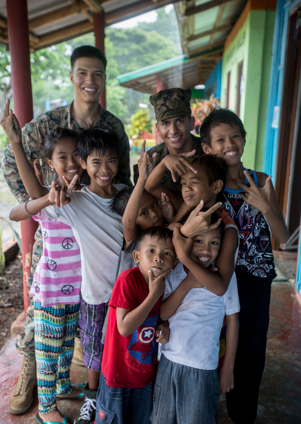 Philippine children interact with U.S. Marines