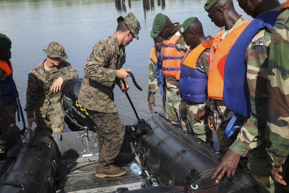 Partnership in action: U.S. Marines, Coast Guardsmen, Senegalese military refine small-boat skills