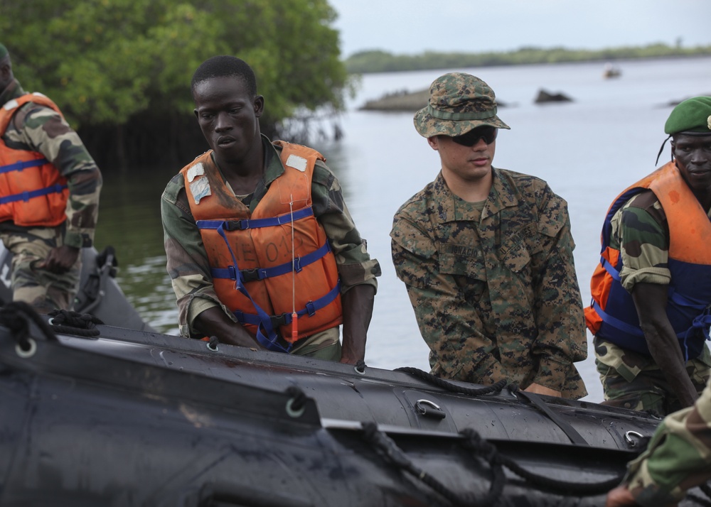 Partnership in action: U.S. Marines, Coast Guardsmen, Senegalese military refine small-boat skills