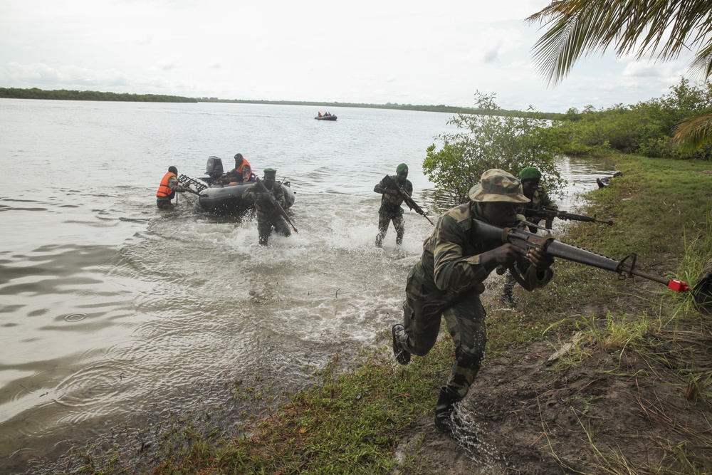 Partnership in action: U.S. Marines, Coast Guardsmen, Senegalese military refine small-boat skills