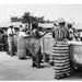 Local Housewives Buying Food from Protected Containers