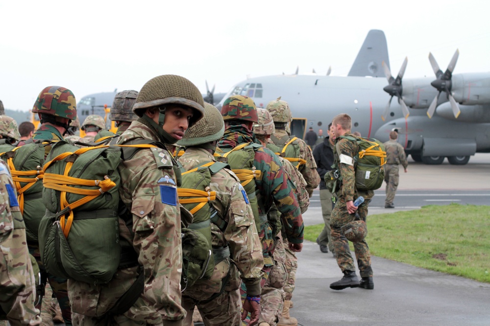 Multinational paratroopers board for commemoration jump