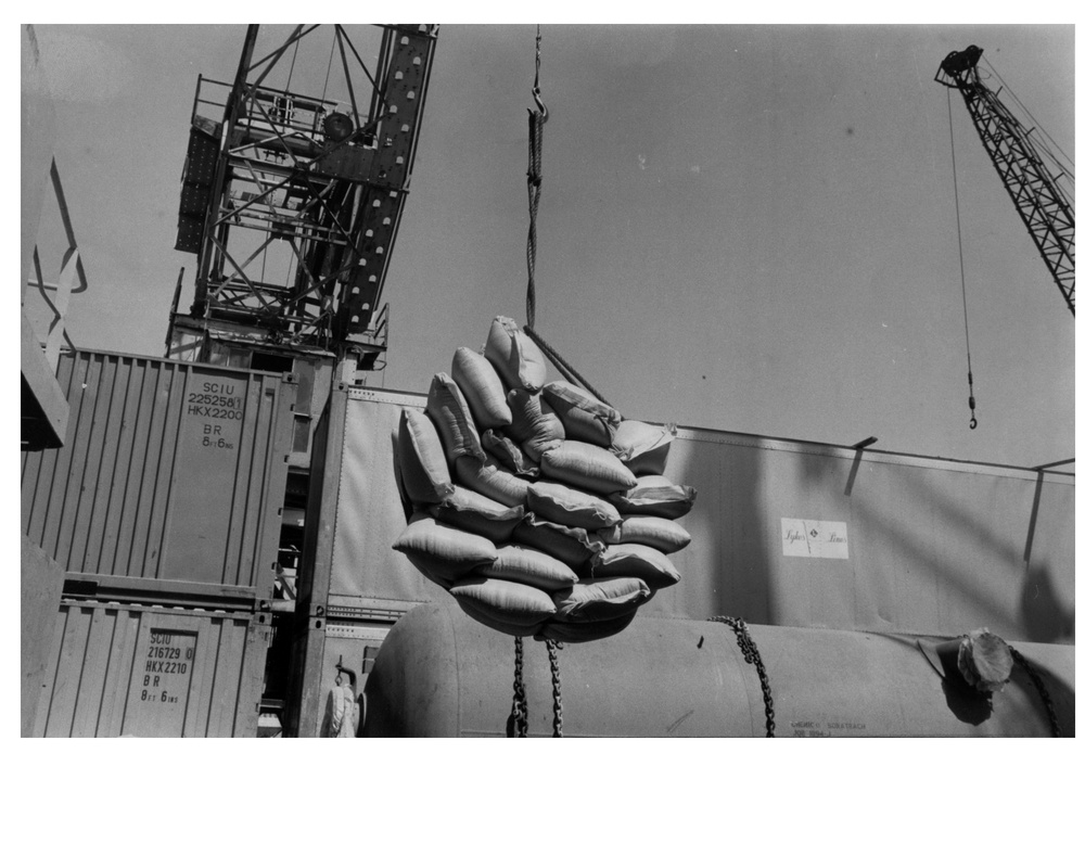 USAID Sorghum is Unloaded from the S. S. Thompson Lykes, an American Freighter