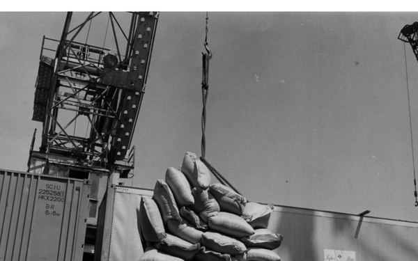 USAID Sorghum is Unloaded from the S. S. Thompson Lykes, an American Freighter