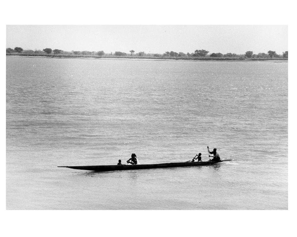 Family in Pirogue, Macina, Mauritania