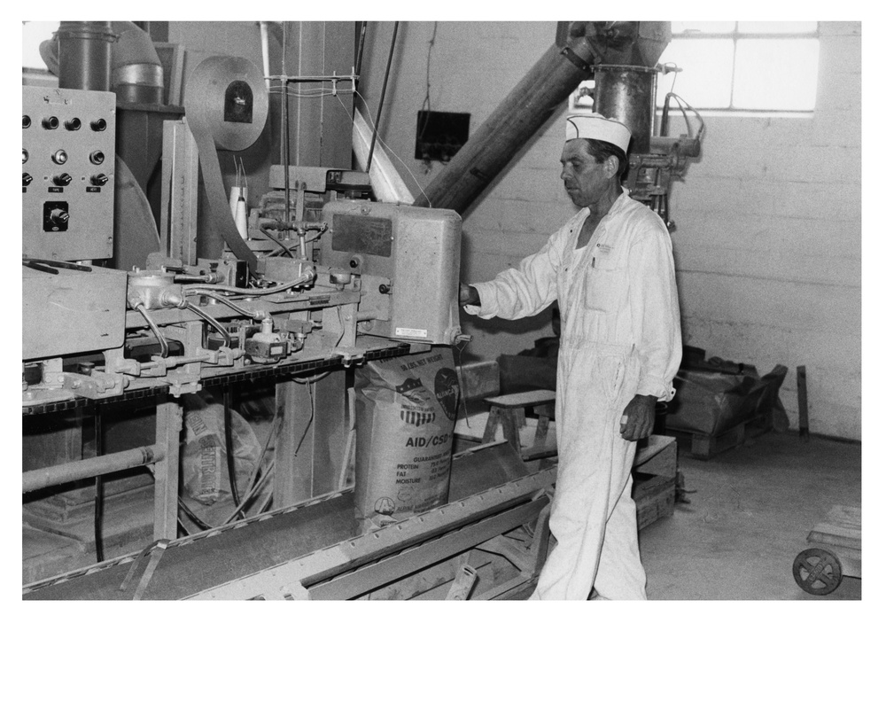 Men Working at Fish Protein Concentrate Flour Plant