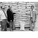 Ambassador John Blane and DCM Donald Hester Examine USAID  Food in ADRA Warehouse, Kigali, Rwanda