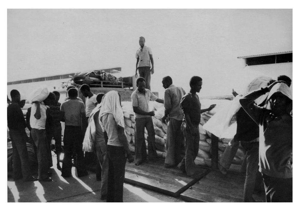 Unloading AID food at CRS Warehouse