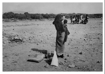 Woman and Child with AID Food