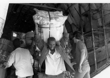 Unloading Blankets from Airplane