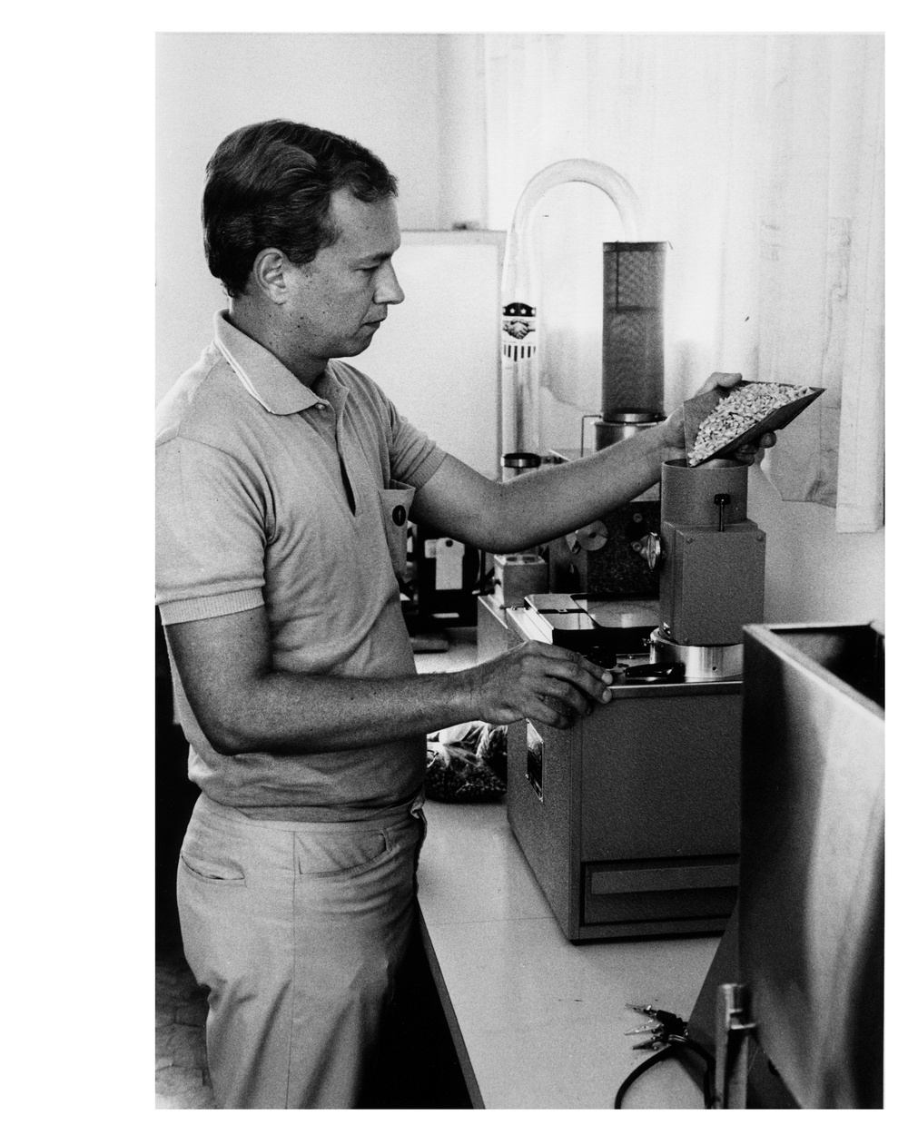 Man Inspecting Seeds in Laboratory - Brazil