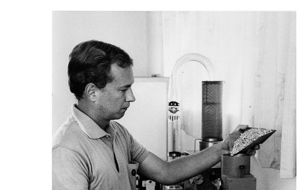 Man Inspecting Seeds in Laboratory - Brazil