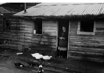 Woman in Chepe Hill house - Chile