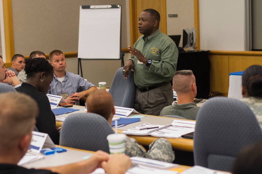 Army Reserve Soldiers, families train together to improve unit family readiness