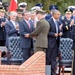 Secretary of defense shakes hands with the new chairman of the Joint Chiefs of Staff