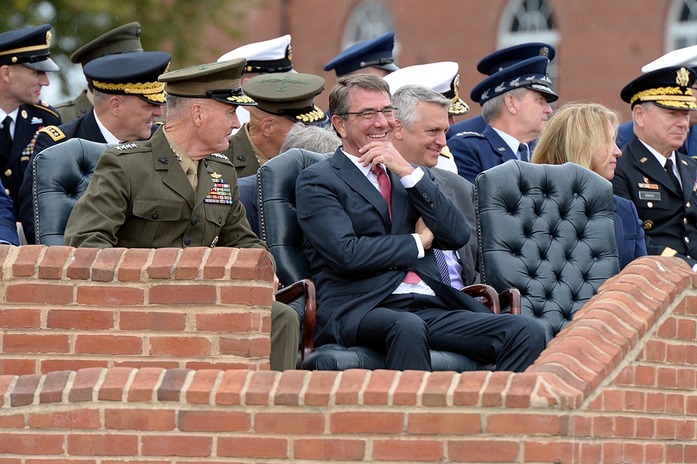 Secretary of defense shares a smile with the new chairman of the Joint Chiefs of Staff