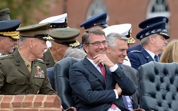 Secretary of defense shares a smile with the new chairman of the Joint Chiefs of Staff