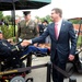 Secretary of defense shakes hands with Capt. Luis Avila