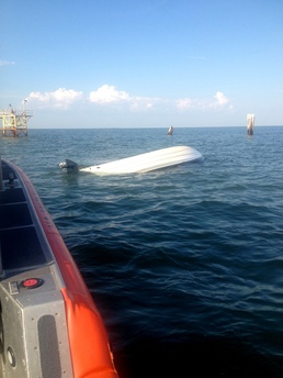Capsized boat near Texas City Dike