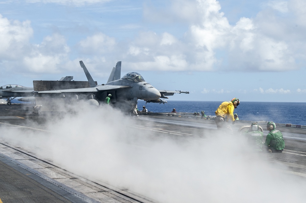'Jolly Rogers' Super Hornet prepares to launch from USS Harry S. Truman