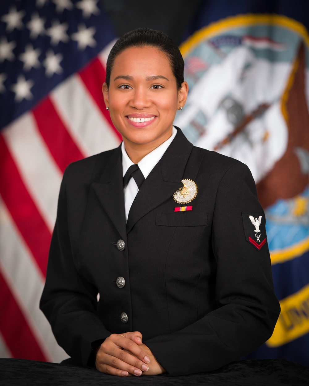 Official portrait, uncovered, Intelligence Specialist Third Class Marisol Quinones Viera, US Navy