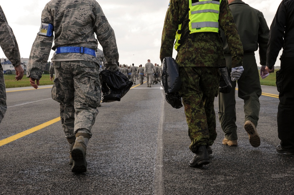 U.S., Estonian Airmen gather, clean flight line