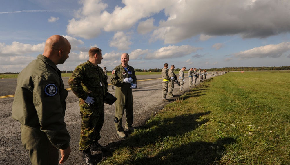 U.S., Estonian Airmen gather, clean flight line