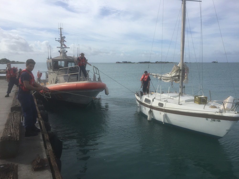 Coast Guard Station Honolulu tows aground sailboat in Kalihi Channel