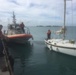 Coast Guard Station Honolulu tows aground sailboat in Kalihi Channel