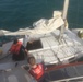 Coast Guard Station Honolulu tows aground sailboat in Kalihi Channel