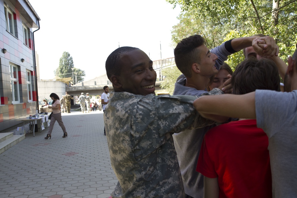 In the shadow of the Austerlitz Bridge: NATO troops promote tolerance and equality in Mitrovica