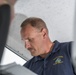 Lt. Cmdr. David Cripe inspects a new fishing vessel