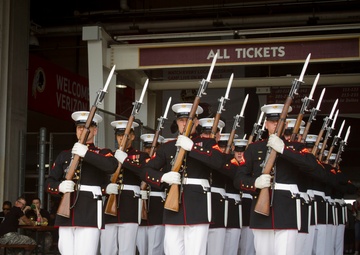 U.S. Marine Corps Silent Drill Platoon performs at the Washington Redskins’ Military Appreciation Day