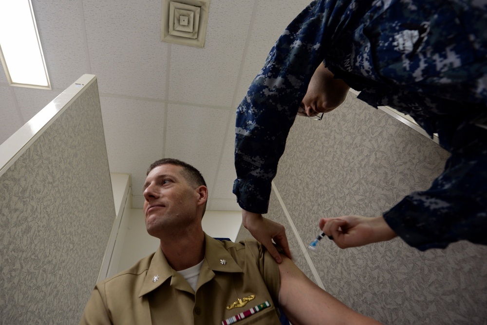 Patients receive flu vaccination at Naval Health Clinic Hawaii