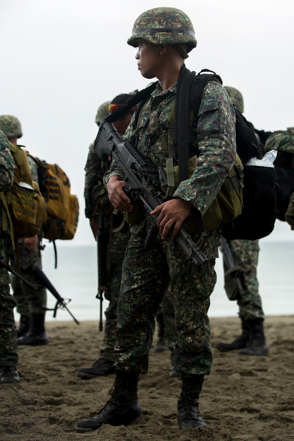 Philippine service members ride on a LCAC during PHIBLEX 15