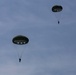 Recon Marines jump from planes in the Philippines