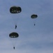 Recon Marines jump from planes in the Philippines