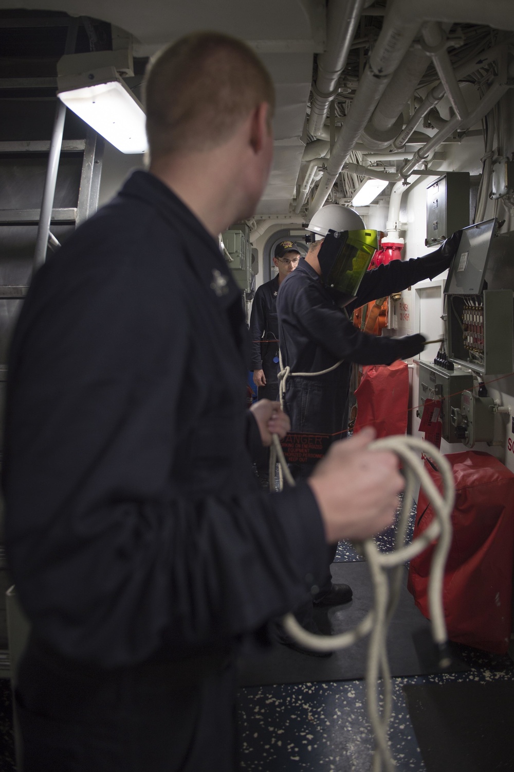 USS Gravely Sailors conduct maintenance tag out