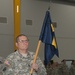 Command sergeant major holds the 86th Troop Command's guidon
