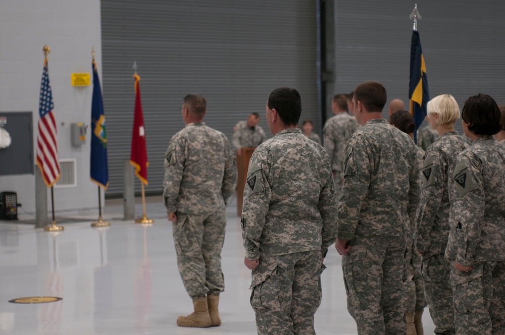 Soldiers stand at attention during change of command ceremony