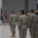 Soldiers stand at attention during change of command ceremony