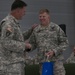 Outgoing battalion commander receives gift